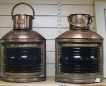 A pair of ship's copper lamps, dated 1860