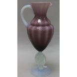 A Murano glass opalescent and mauve coloured ewer