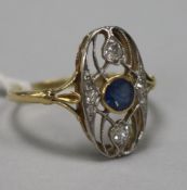 An early 20th century Art Nouveau gold, sapphire and diamond set oval dress ring, size Q.