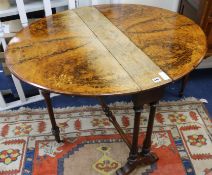 A Victorian walnut Sutherland table, W.90cm