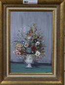 C. Coureyoil on canvasStill life of flowerssigned indistinctly34 x 23cm