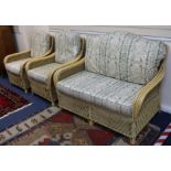 A three piece rattan suite