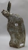 An Ian Gregory sculpture of a suffering hare