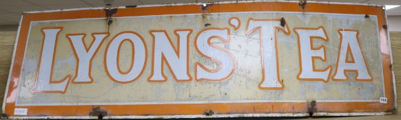 A large Lyon's Tea enamel sign