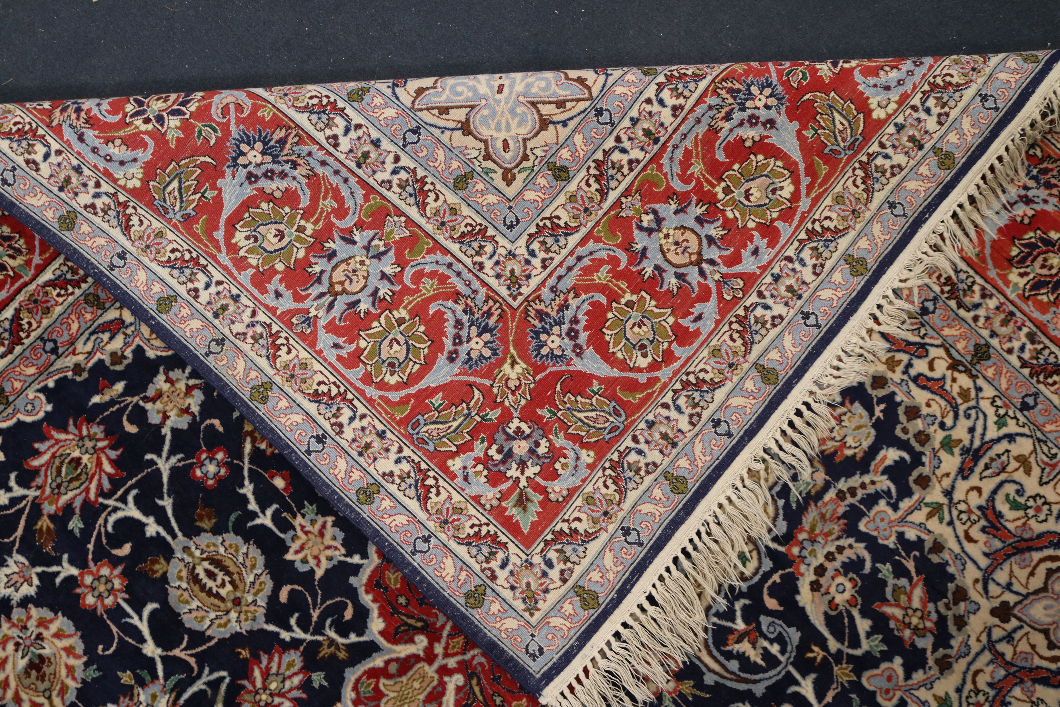 A Tabriz blue medallion rug 222 x 156cm. - Image 8 of 8