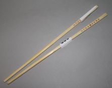 A pair of early 20th century ivory chopsticks