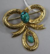 A Victorian style 9ct gold and turquoise drop ribbon bow brooch, 52mm.