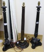 A pair of Louis Philippe style bronzed effect table lamps and a mahogany and gilt table lamp