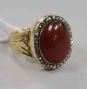 A Victorian gold, carnelian and rose cut diamond set oval dress ring, size S.