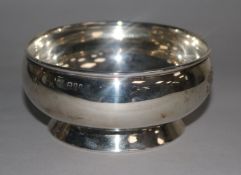 A plain circular silver bowl, makers Goldsmiths & Silversmiths Co, London, 1921, 11cm, 4 oz.