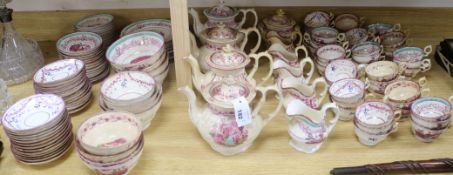 A Staffordshire Queen Victoria and Prince Albert commemorative pink lustre tea set