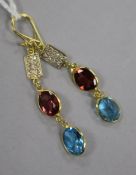 A modern pair of 14ct gold, garnet, blue topaz and diamond set drop earrings, 31mm.