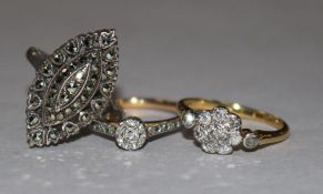 An 18ct gold and diamond cluster ring, a 9ct gold, platinum and diamond illusion-set ring and a