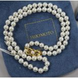 A single strand Mikimoto cultured pearl necklace with 18ct gold clasp, with Mikimoto pouch and spare