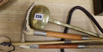 A silver mounted riding whip, two riding crops and a brass ladle