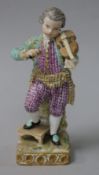 A Meissen figure of a boy violinist