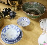 A Chinese bowl, two blue and white bowls and two plates