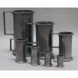 Seven French Provincial graduated pewter measures