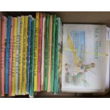 A collection of 16 Ladybird books and seven albums of tea and cigarette cards, the Ladybird books