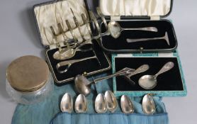 An Edwardian silver toast rack, 4 pairs of childrens feeding pushers, a set of 6 Georgian silver