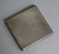 A 1930's engine turned silver slide action cigarette case.