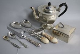 A silver octagonal urn-shaped teapot, a silver cigarette box, a teaspoon with rifle handle and