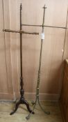 Two fire screen poles H.148cm and H.147cm