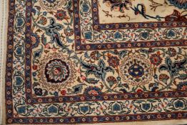 A Tabriz cream ground carpet 387 x 279cm