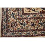 A Tabriz cream ground carpet 387 x 279cm