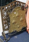 Two Art Nouveau fire screens, copper and brass Both H.76cm