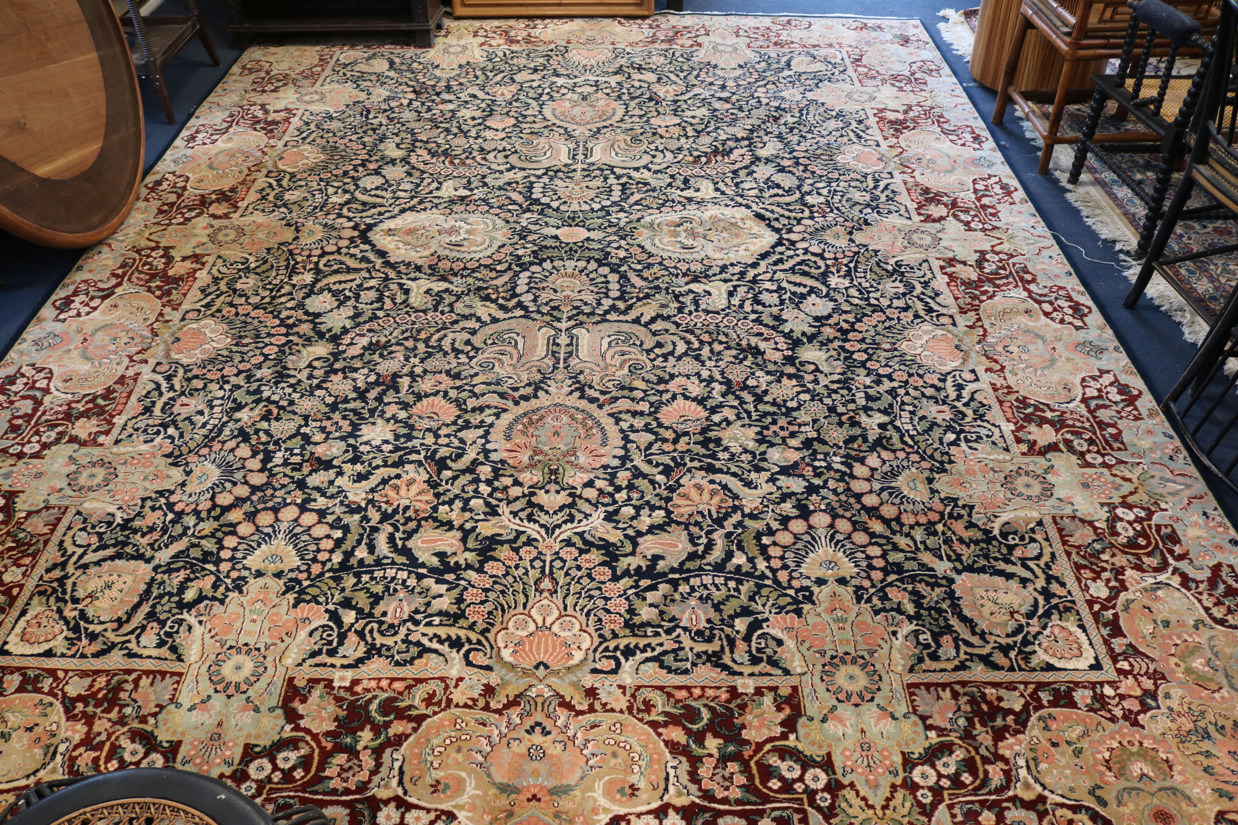 A large blue ground carpet 398 x 298cm