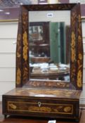 An early 19th century Dutch mahogany and marquetry inlaid toilet mirror