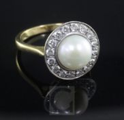 An 18ct gold mabe pearl and diamond cluster circular dress ring, size M.