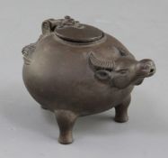 A Chinese bronze tripod ox-head tripod vessel or water dropper, 17th/18th century, brown patina,