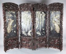 An impressive Japanese carved wood, ivory and Shibayama four-fold screen, by Kobayashi, Meiji
