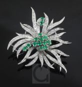 An 18ct white gold and platinum, emerald and diamond set spray brooch, 48mm.