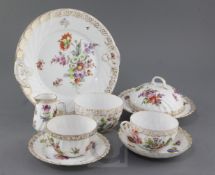 A Dresden thirty five piece tea service, painted with floral sprays