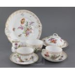 A Dresden thirty five piece tea service, painted with floral sprays