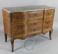 A late 19th century French parquetry serpentine commode, with marble top and three long drawers,