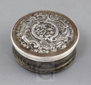 A 19th century continental silver inlaid tortoiseshell circular box and cover, decorated with