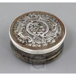 A 19th century continental silver inlaid tortoiseshell circular box and cover, decorated with