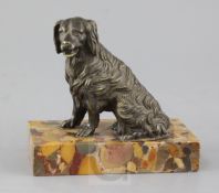 A Victorian bronze model of a seated spaniel, on marble plinth, height 5.5in.