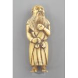 A Japanese ivory netsuke of a bearded man, 19th century, engraved two character signature, 6.2cm