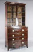 A Regency mahogany secretaire bookcase, with gothic arched astragal glazing and four drawers, W.