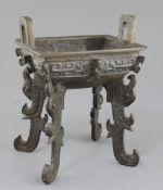 A Chinese bronze quadruped ritual food vessel, Fangding, Western Zhou dynasty or later, cast in