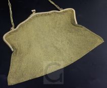 An early 20th century 9ct gold mesh evening purse, with cabochon cut sapphire set clasp, maker,