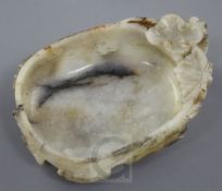 A Chinese white and grey jade brushwasher, 16th / 17th century, carved in high relief and openwork