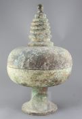 A Chinese bronze reliquary vessel, Tang dynasty, 618-907AD, the vessel of stupa-form with globular