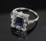 An early 20th century 18ct white gold and platinum, sapphire and diamond cluster ring, of