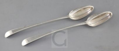 A pair of George III silver feather edge Old English pattern straining spoons, maker, WT?, London,